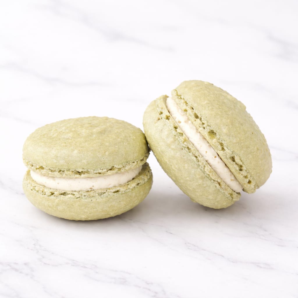 Delicate pistachio macaron with a creamy nutty filling.