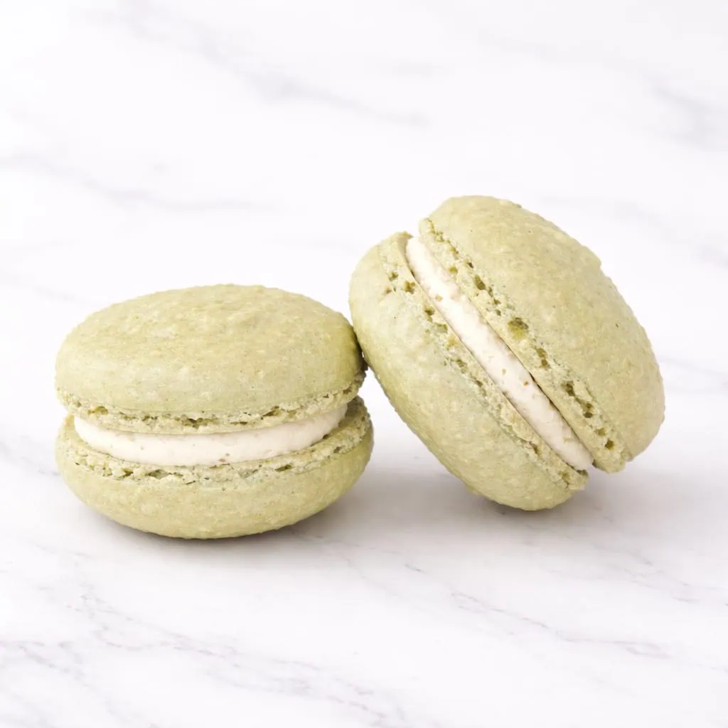 Delicate pistachio macaron with a creamy nutty filling.