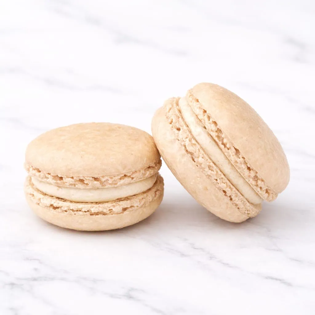 Luxurious praline macaron with creamy filling.