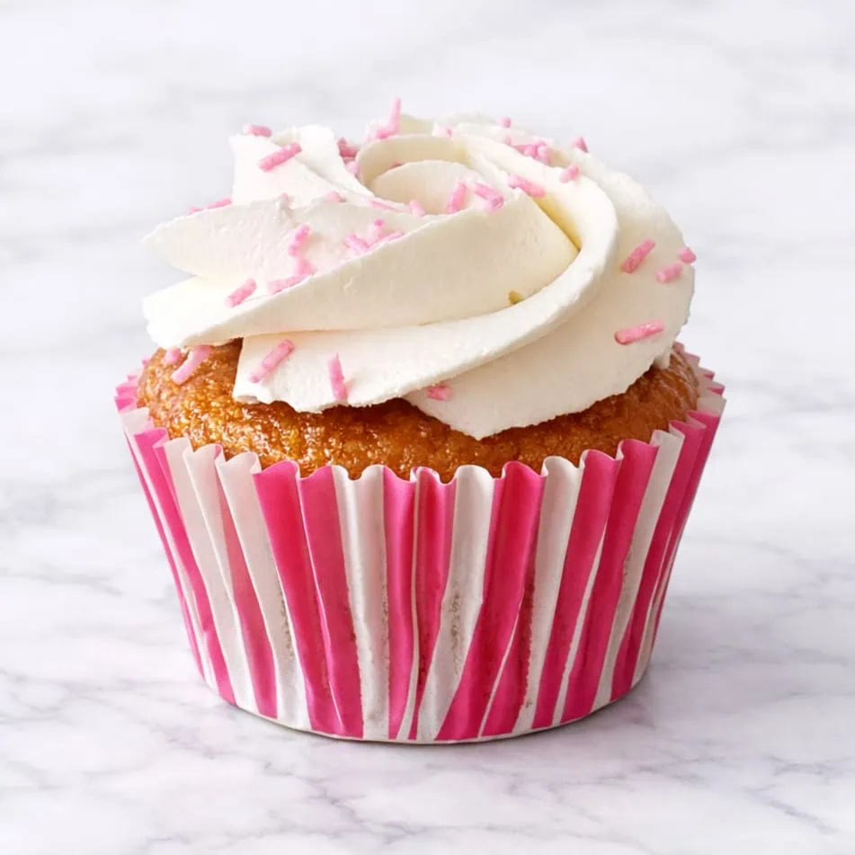 Vegan vanilla cupcake with creamy vegan frosting.
