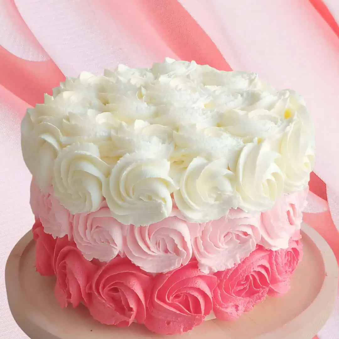 Romantic 3-layer rose dream layer cake in Vanilla & Strawberry or Red Velvet, available in white, pink, or ombre colors