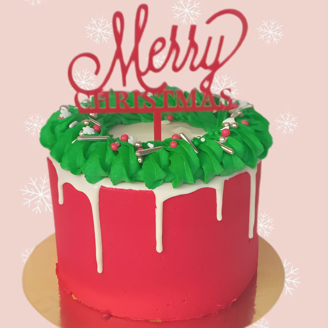 Christmas Celebration Cake a 3-layer cake with white chocolate drip and Christmas tree rosettes