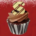 Sinterklaas chocolate cupcake with chocolate frosting and white chocolate letter S decoration