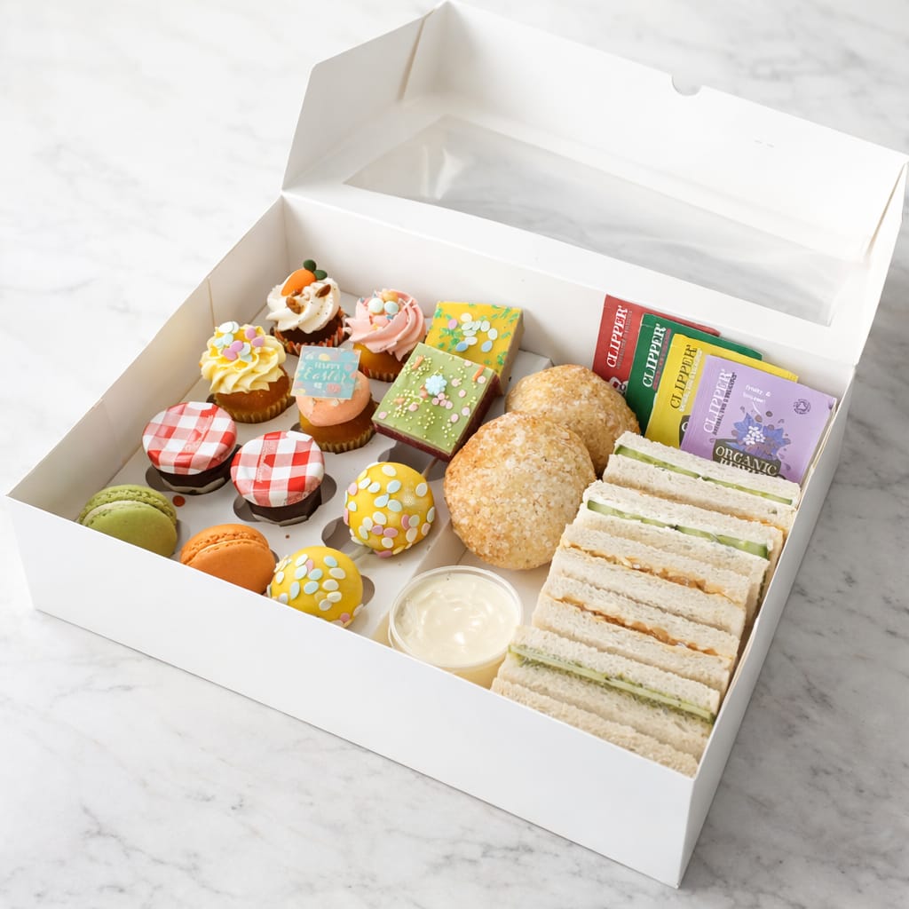 Easter High Tez Box - including asssorted cakepops and brownies featuring flavors like Nutella Blondie and Vanilla dipped in pink chocolate.