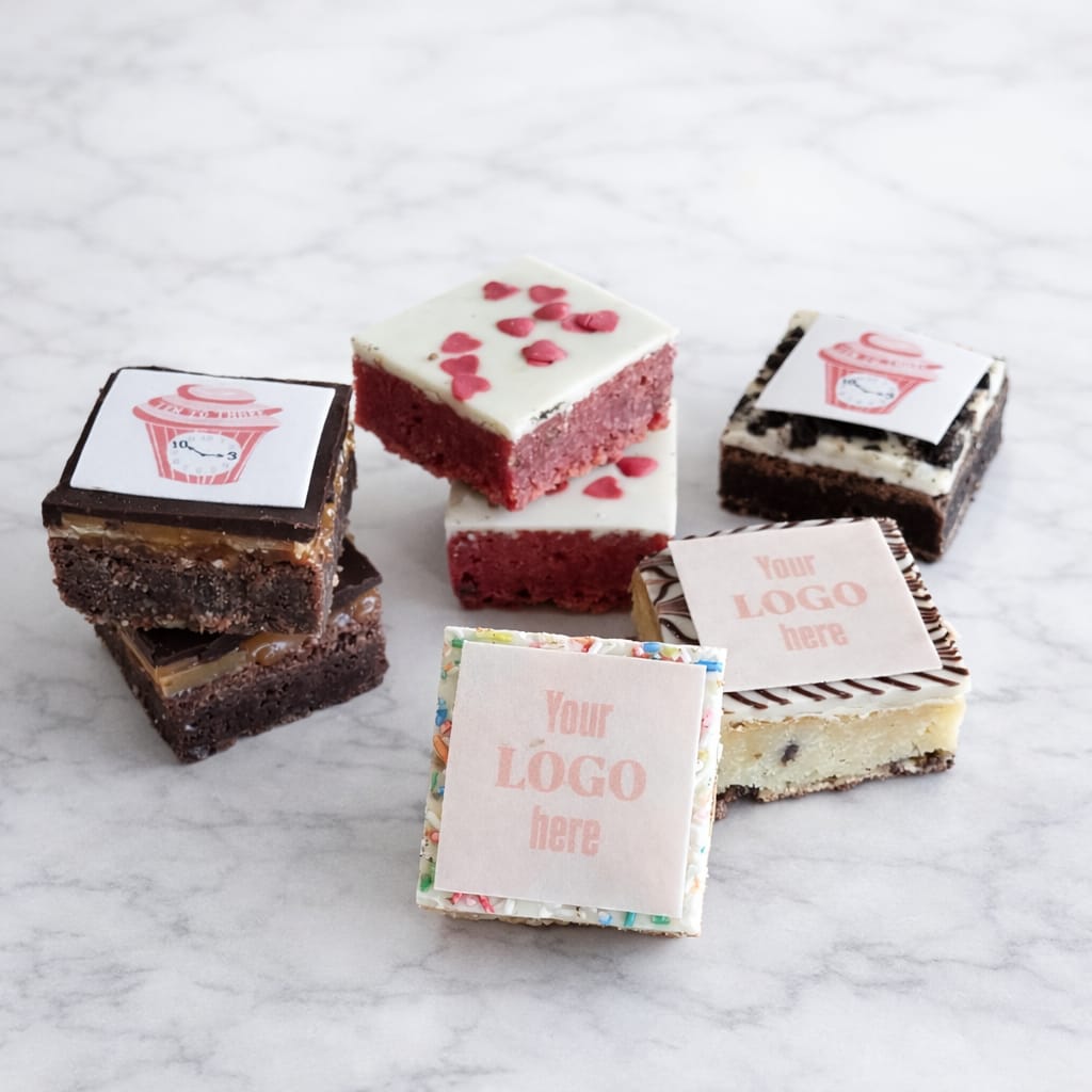 Brownie or blondie with fondant corporate logo.