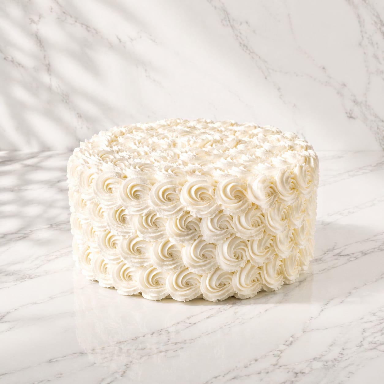 Rose Dream Wedding Cake enrobed in white buttercream roses