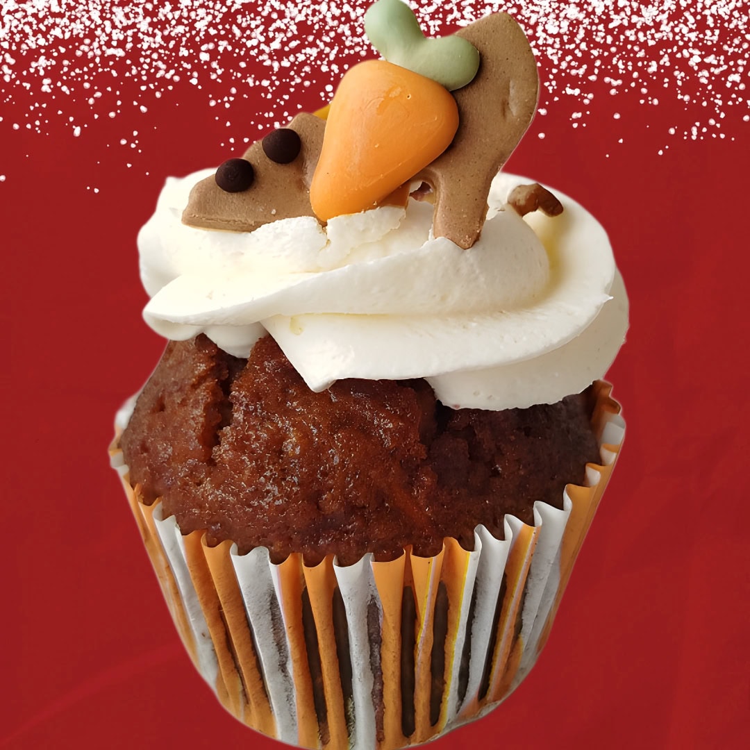 Carrot cupcake with cream cheese frosting and fondant carrot decoration