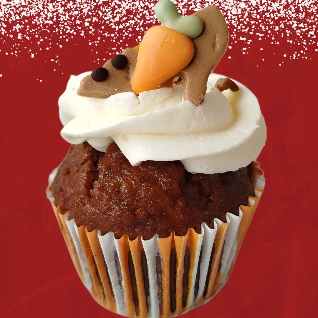 Carrot cupcake with cream cheese frosting and fondant carrot decoration