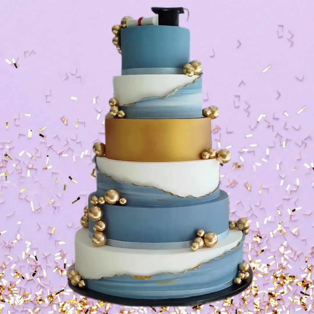 6-layer show cake with real top tier in white, gold, and pastel colours – perfect event centrepiece