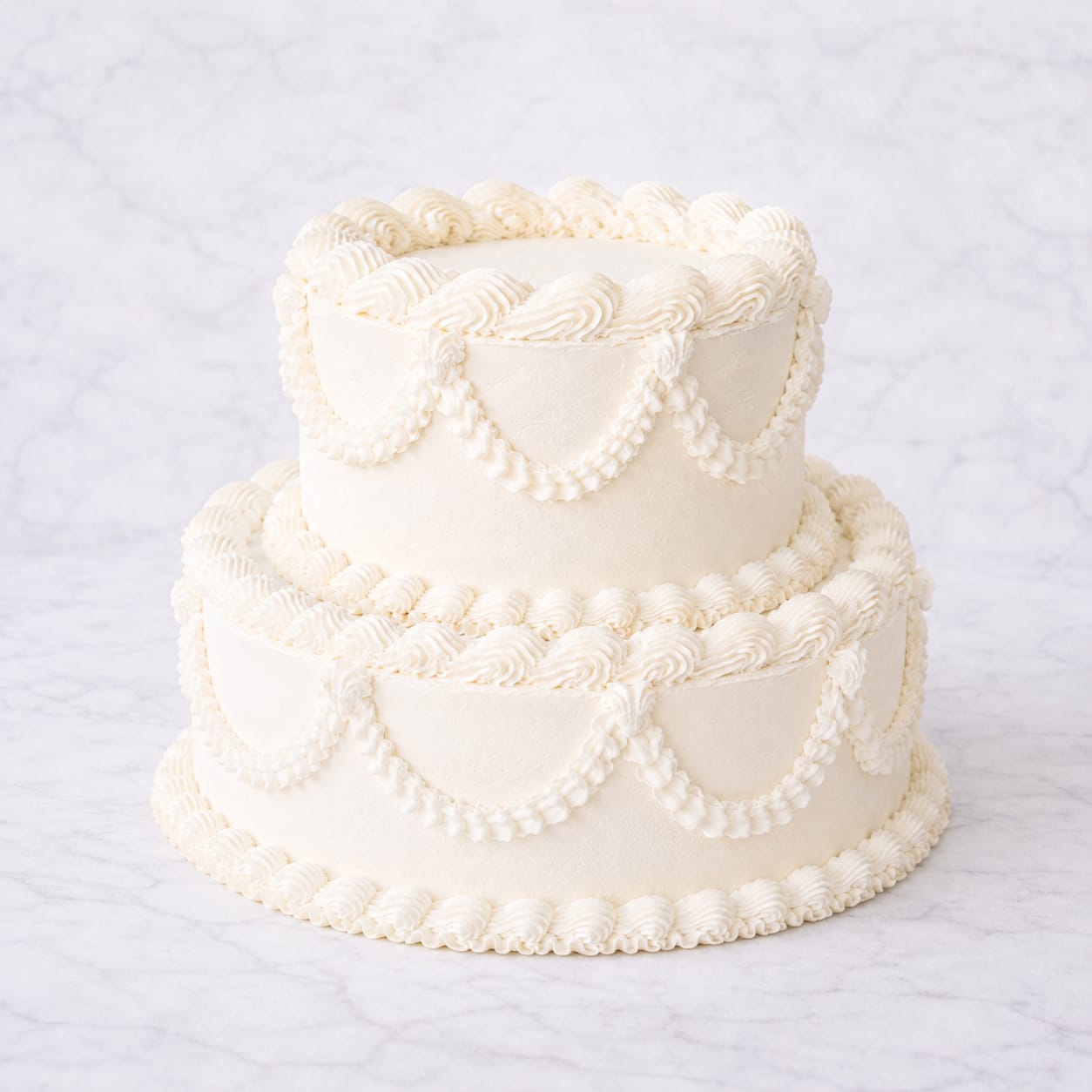 romantic baroque wedding cake with white buttercream piping