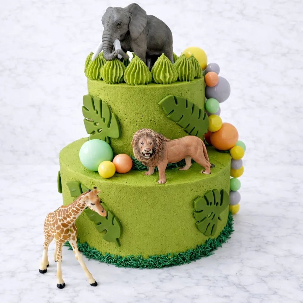 Jungle Party Cake with Green Buttercream and Animal Toppers