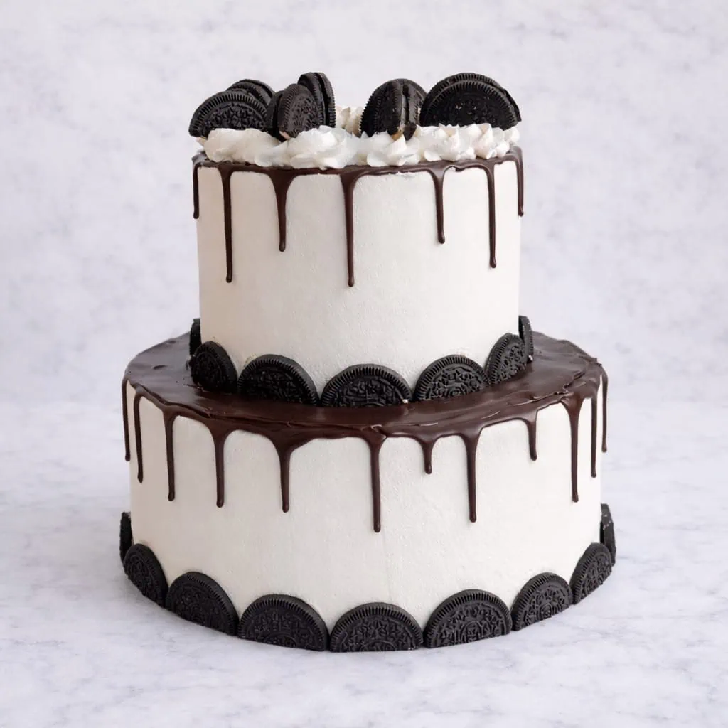 2 Tier Oreo Drip Cakewith chocolate drip for celebrations.
