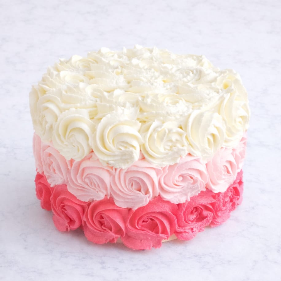 Romantic 3-layer rose dream layer cake in Vanilla & Strawberry or Red Velvet, available in white, pink, or ombre colors
